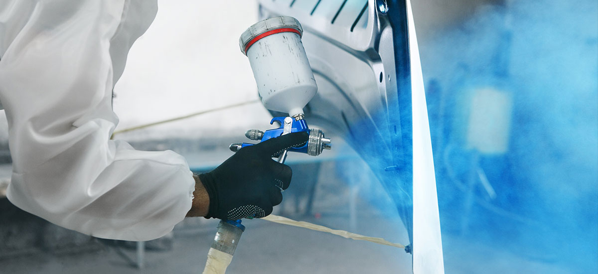 vehicle painting in auto repair booth
